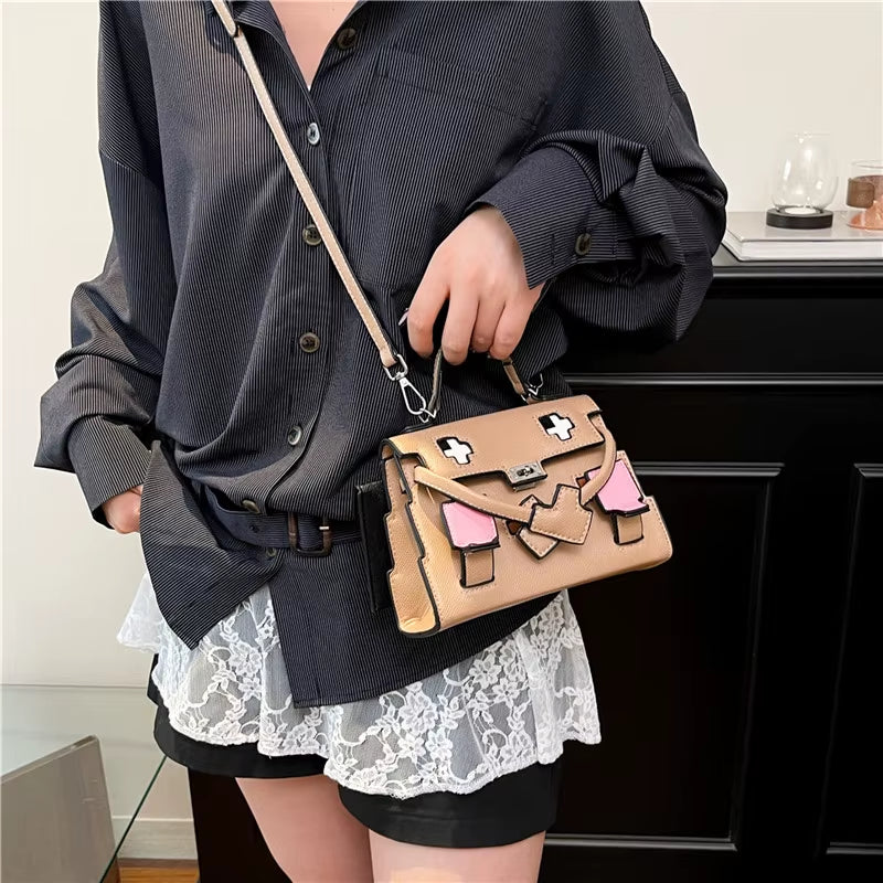 Regal & Reckless Little Monster Signature Bag
