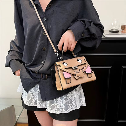 Regal & Reckless Little Monster Signature Bag