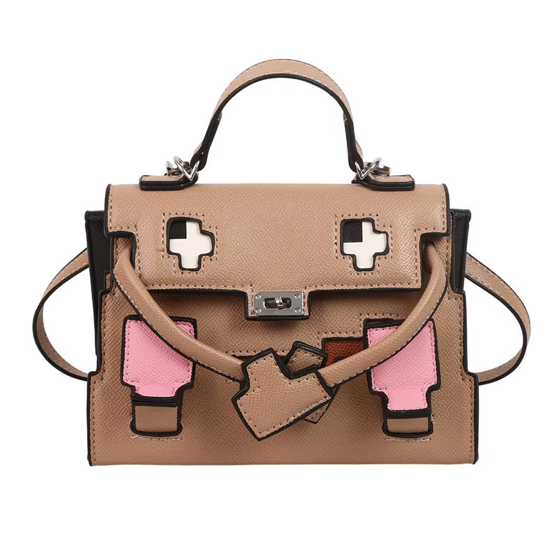 Regal & Reckless Little Monster Signature Bag