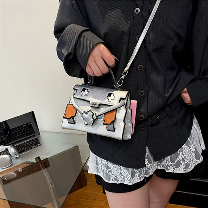Regal & Reckless Little Monster Signature Bag